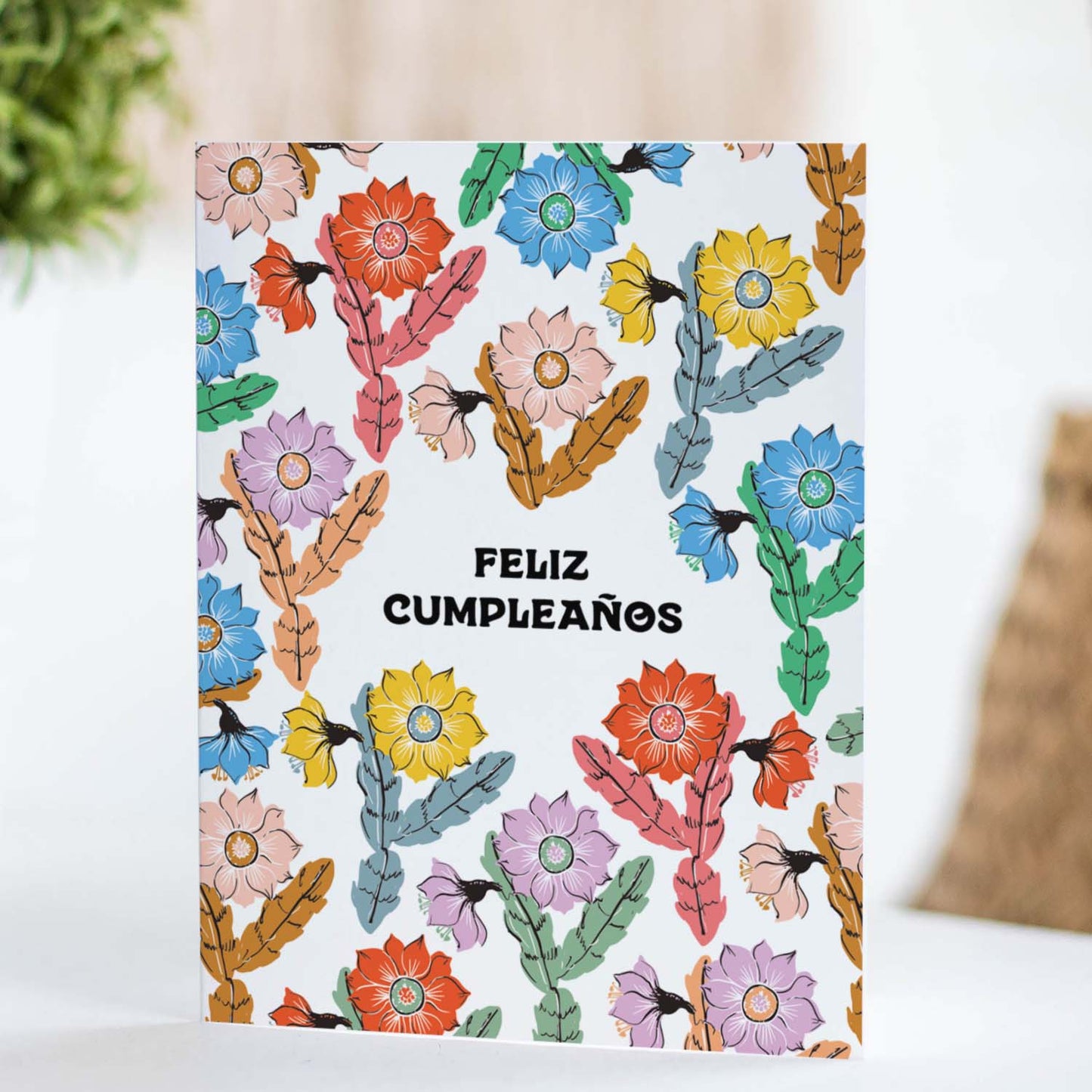 Tarjeta de felicitación con orquídea, cactus y feliz cupleanos